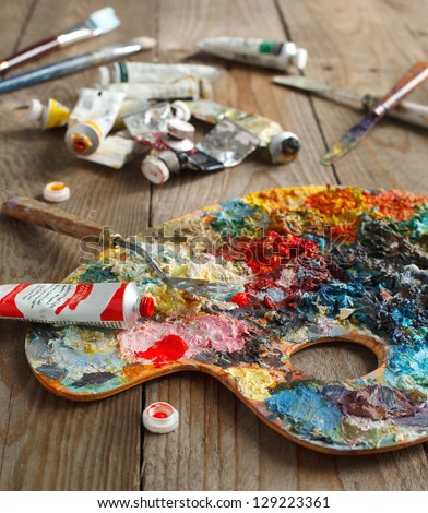 Palette with oil paint and palette-knife.