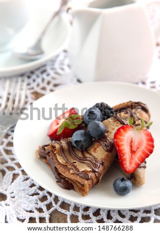 Chocolate crepes with fresh berries