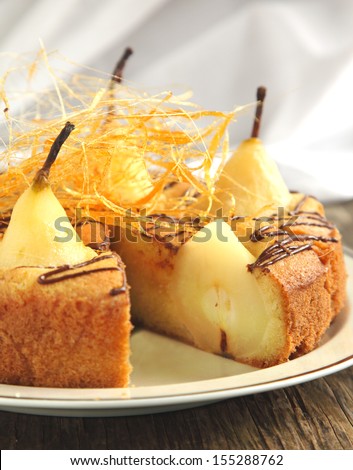 Cake with pears with spun sugar strands