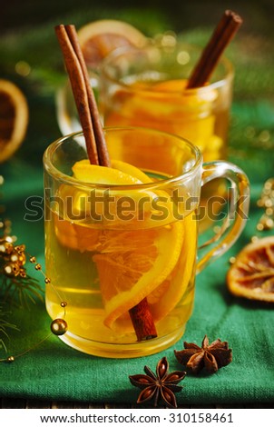 Hot apple cider in a glass cup