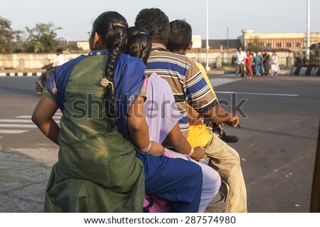 CHENNAI/INDIA 27TH JANUARY 2007 - Family of four on one moped in Chennai India
