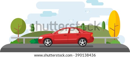 Red Family Sedan Traveling across the countryside