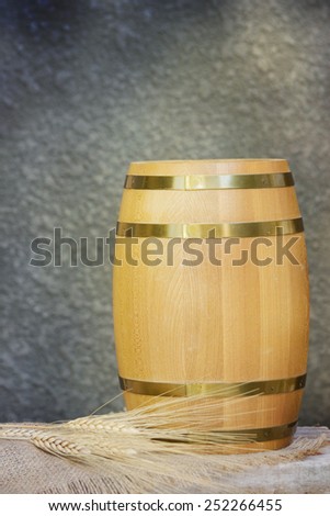Old oak barrel on a wooden table