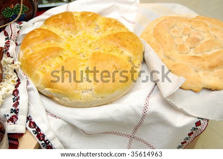 Home-made Christmas bread .Bulgarian Christmas Eve dinner tradition involves hiding a coin in the loaf of Christmas bread. The person who finds the coin can also expect good luck in the year to come