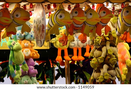 Prizes hang at an amusement park game