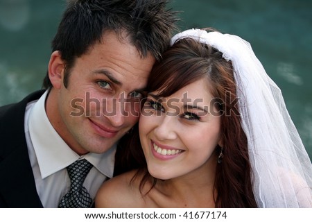 Gorgeous happy smiling couple on their wedding day