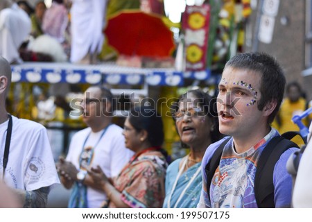 TORONTO, ONTARIO/CANADA - JULY 13: Devotees of Lord Krishna celebrating during the 41st Annual Festival of India on July 13, 2013 in Toronto,Canada.