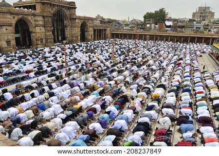 AHMEDABAD, GUJARAT/INDIA - 29TH TUESDAY JULY  2014 : Muslims celebrating Eid al-Fitr which marks the end of the month of Ramadan, in Jama Masjid,Ahmedabad, India.