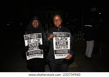 TORONTO, ONTARIO/CANADA - 25th Tuesday November  2014 : Toronto\'s Black Community takes action in solidarity with Ferguson protesters in Toronto, Canada.