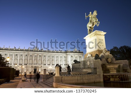 MADRID, SPAIN - NOV 14:  Equestrian statue of king Philip IV in front of The Royal Palace of Madrid. The statue was created in 17th century by Italian sculptor Pietro Tacca. Nov 14, 2012 Madrid, Spain