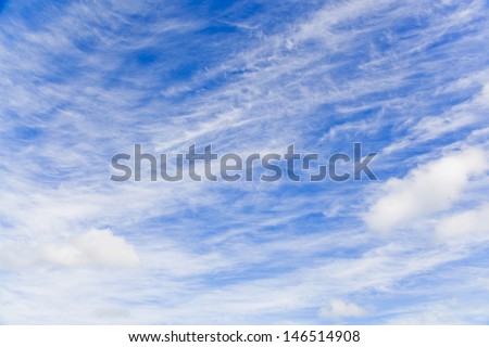 Cloudscape over blue sky