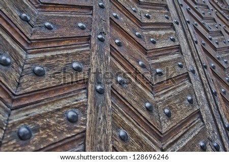 Close up of old strong wooden door