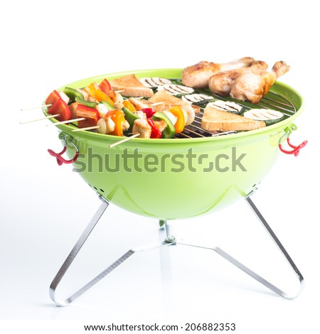 portable barbecue with grilled food - studio