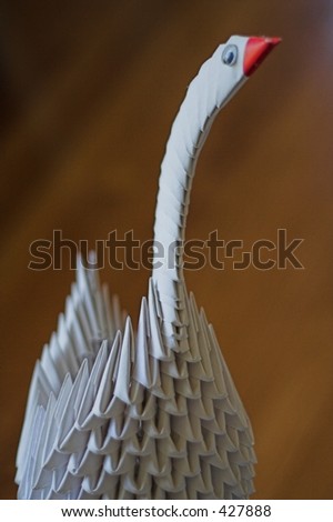 paper swan made out of little triangles pieces