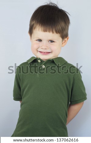 Sheepish Grin On Little Boy Stock Photo 137062616 : Shutterstock