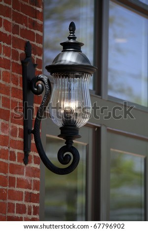 decorative lamp on the side of a building in Nashville