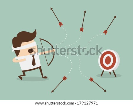 Blindfold businessman shooting arrow 