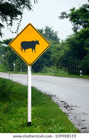 Beware of the cow sign presents everywhere along the road in countryside.