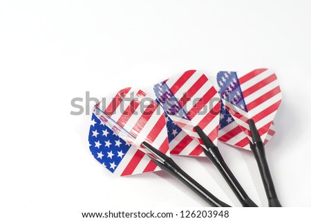 Three target playing darts, whit USA flag colors in the feather, isolated