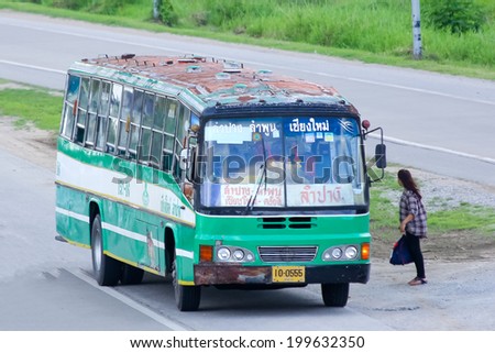 CHIANGMAI, THAILAND- MAY 21 2014:  Greenbus company bus route Lampang and Chiangmai. Budget fan bus. Photo at Road No.11 about 5 Km from Chiangmai city.