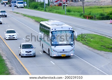 CHIANGMAI, THAILAND -MAY 21 2014: Sunlong Bus of Green bus Company. Between Chiangmai and Thungchang (Nan). Photo at Road No.11 about 5 Km from Chiangmai city.