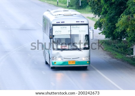 CHIANGMAI, THAILAND -MAY 21 2014: Scania Bus of Green bus Company. Between Maesai (Chiangrai) and Maesot (Tak). Photo at Road No.11 about 5 Km from Chiangmai city.