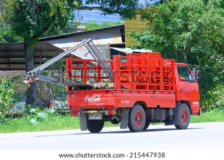CHIANGMAI , THAILAND - AUGUST 22 2014: Coca Cola Truck (Coke). Photo at road no 121 about 8 km from downtown Chiangmai, thailand.