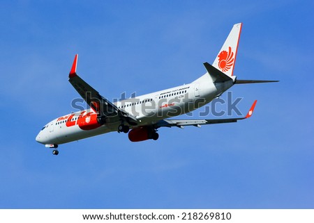 CHIANGMAI , THAILAND - SEPTEMBER 10 2014: HS-LTH Boeing 737-900ER of Thai lion air airline , landing to Chiangmai airport from Bangkok Don Muang Airport, thailand.