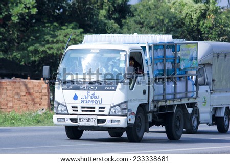CHIANGMAI, THAILAND - NOVEMBER  21 2014:  Drinking water delivery truck of Dew Drop company. Photo at road no.121 about 8 km from downtown Chiangmai, thailand.