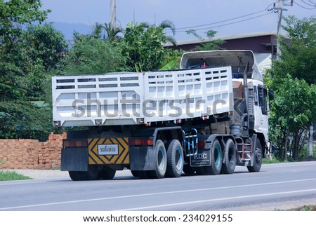 CHIANGMAI , THAILAND - NOVEMBER 26 2014: Private dump truck. Photo at road no.121 about 8 km from downtown Chiangmai, thailand.
