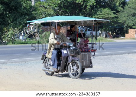 CHIANGMAI, THAILAND - NOVEMBER 27 2014: Private Motorcycle taxi. Service in Village. Photo at road no 121 about 8 km from downtown Chiangmai, thailand.