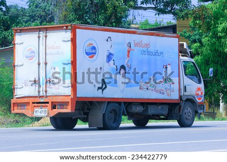 CHIANGMAI, THAILAND - SEPTEMBER  29 2014:  Refrigerated container mini truck of PNK milk product. Photo at road no 121 about 8 km from downtown Chiangmai, thailand.