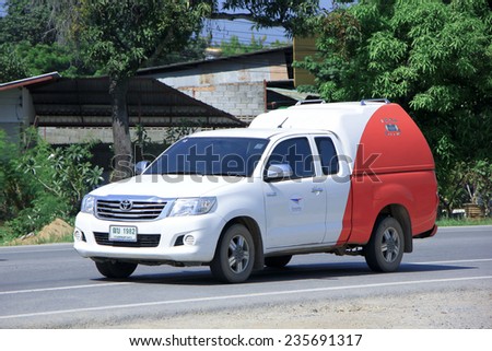 CHIANGMAI, THAILAND - OCTOBER 4 2014: An unidentified Mini truck of Thailand Post. Photo at road no.121 about 8 km from downtown Chiangmai, thailand.