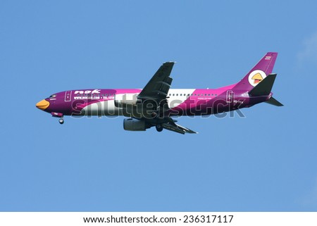 CHIANGMAI , THAILAND- NOVEMBER 7 2007: HS-TDA Boeing 737-400 of NokAir airline ( Low-cost Airline), Landing to Chiangmai airport from Bangkok Don Muang Airport, thailand.