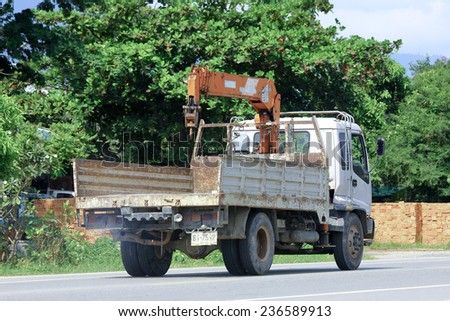 CHIANGMAI, THAILAND -OCTOBER 6 2014: Private Truck with crane. Photo at road no.121 about 8 km from downtown Chiangmai, thailand.