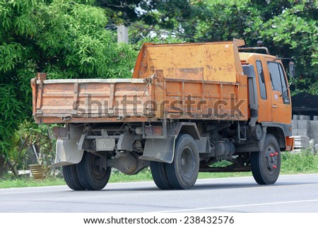 CHIANGMAI, THAILAND -OCTOBER 10 2014:  Dump truck of Provincial eletricity Authority of Thailand. Photo at road no.121 about 8 km from downtown Chiangmai, thailand.