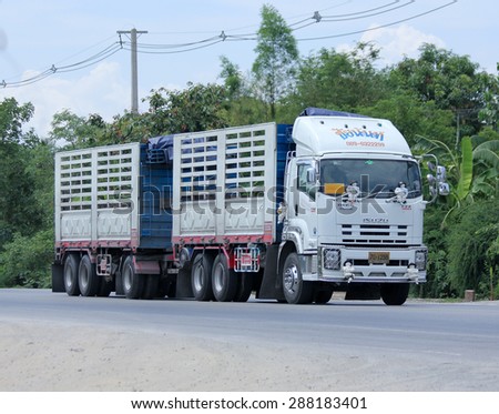 CHIANGMAI , THAILAND -JUNE 8 2015: Cargo  truck of Chainan Transport Company. Photo at road no.121 about 8 km from downtown Chiangmai, thailand.
