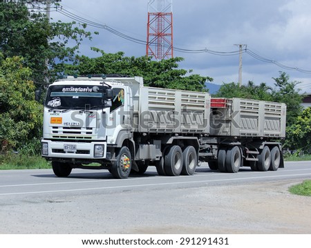 CHIANGMAI, THAILAND -JUNE 28 2015:  Trailer dump truck of Supha company. Photo at road no 121 about 8 km from downtown Chiangmai, thailand.