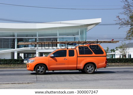 CHIANGMAI , THAILAND- FEBRUARY 5 2015: Pickup truck of CAT Telecom Public Company Limited. Intenet and Telephone Service in Thailand. Photo at road no 121 about 8 km from downtown Chiangmai, thailand.
