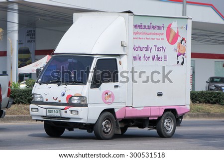 CHIANGMAI , THAILAND - FEBRUARY  6 2015: Mini Delivery Truck of Smile Milk, Icecream product from Fresh Milk. Photo at road no.1001 about 8 km from downtown Chiangmai, thailand.