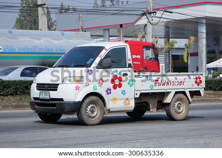 CHIANGMAI , THAILAND - FEBRUARY  6 2015: Suzuki Carry truck of Eve Flower Company.  Photo at road no 121 about 8 km from downtown Chiangmai, thailand.