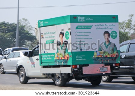 CHIANGMAI , THAILAND -DECEMBER 30 2014:  Pickup Truck and Container For Tesco lotus Delivery Service. New service with shop online. Photo at road no 1001 about 8 km from downtown Chiangmai, thailand.