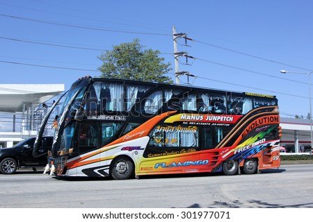 CHIANGMAI , THAILAND -JANUARY 11 2015: Travel bus of Manus Junpetch Travel Company. Photo at road no.1001 about 8 km from downtown Chiangmai, thailand.