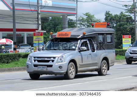 CHIANGMAI, THAILAND -AUGUST 8 2015:  Private School pick up truck. Photo at road no.121 about 8 km from downtown Chiangmai, thailand.