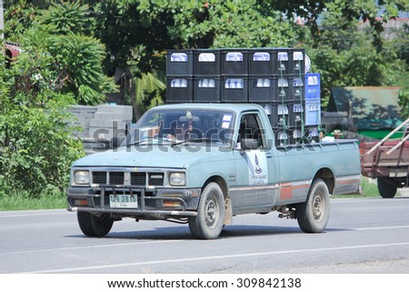 CHIANGMAI, THAILAND -AUGUST 10 2015:  Drinking water delivery truck of Nam Nueng company. Photo at road no.1001 about 8 km from downtown Chiangmai, thailand.