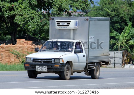 CHIANGMAI, THAILAND -AUGUST 10 2015:  Refrigerated container Pick up truck of Sahagorn milk product. Photo at road no 121 about 8 km from downtown Chiangmai, thailand.