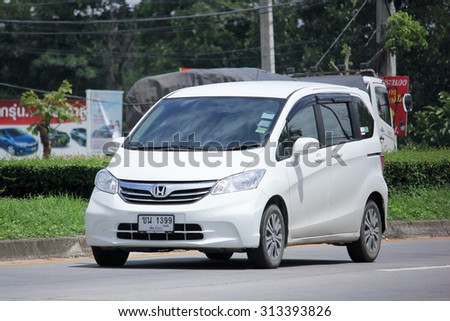 CHIANGMAI, THAILAND -AUGUST 13 2015:  Private Honda Freed van. Photo at road no.121 about 8 km from downtown Chiangmai, thailand.