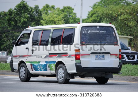 CHIANGMAI, THAILAND -AUGUST 13 2015:   Private School van ( White Toyota Van). Photo at road no.121 about 8 km from downtown Chiangmai, thailand.