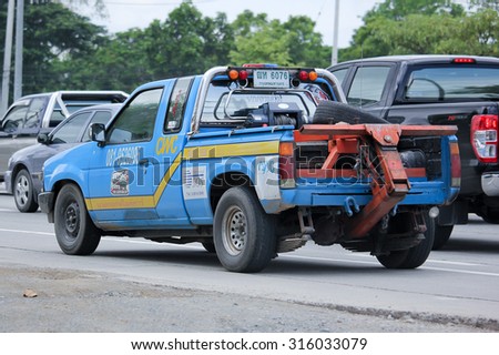 CHIANGMAI, THAILAND -AUGUST 14 2015:  Tow truck for emergency car move, Bangkok Slide on Company. Photo at road no.1001 about 8 km from downtown Chiangmai, thailand.
