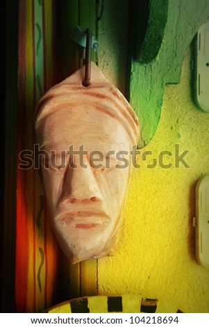 African mask on wall